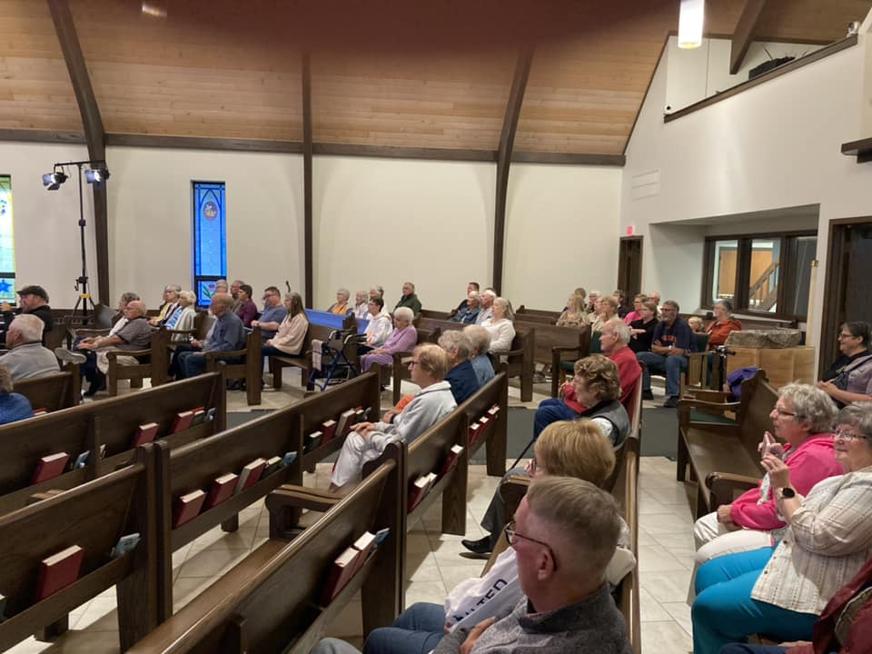 Congregation gathered in pews for worship